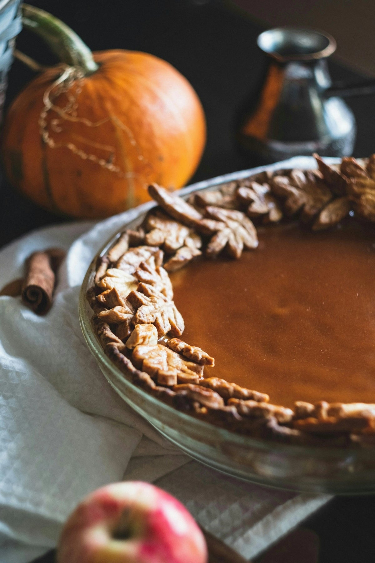 Pumpkin Pie next to a pumpkin