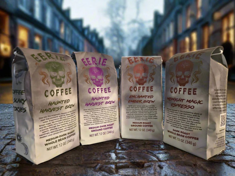 All of our Fall coffee bag offerings on a cobble street